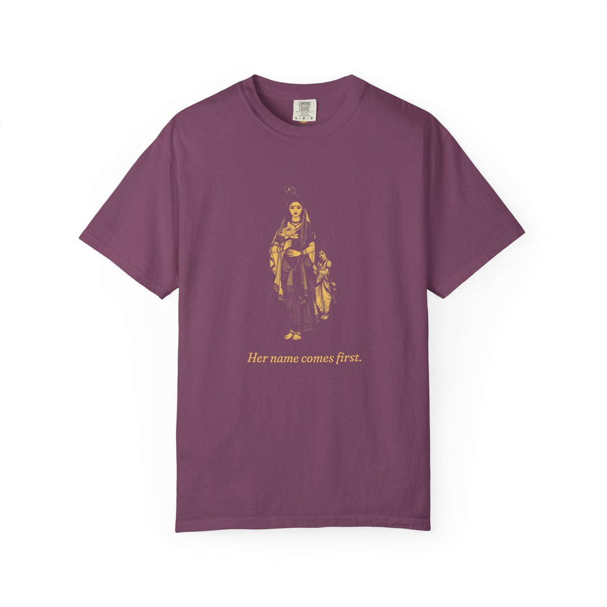 Radha · “Her name comes first.” — Garment-Dyed One-Ink Tee