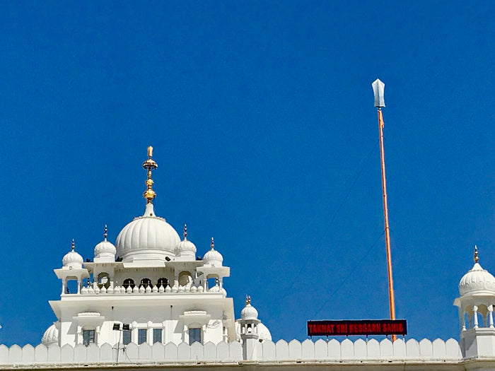 Takht Sri Keshgarh Sahib, Anandpur Sahib, birthplace of the Khalsa, with the tall Nishan Sahib flagpole beside it.