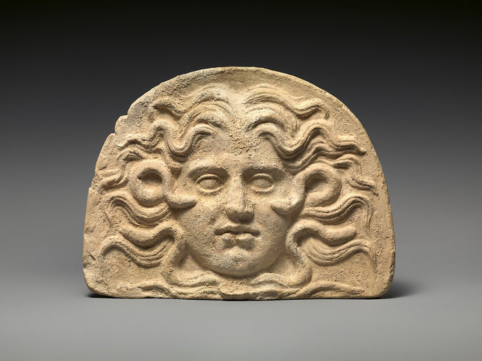 Terracotta antefix with the head of Medusa, 4th century BC, showing the protective gorgoneion used as an architectural emblem.