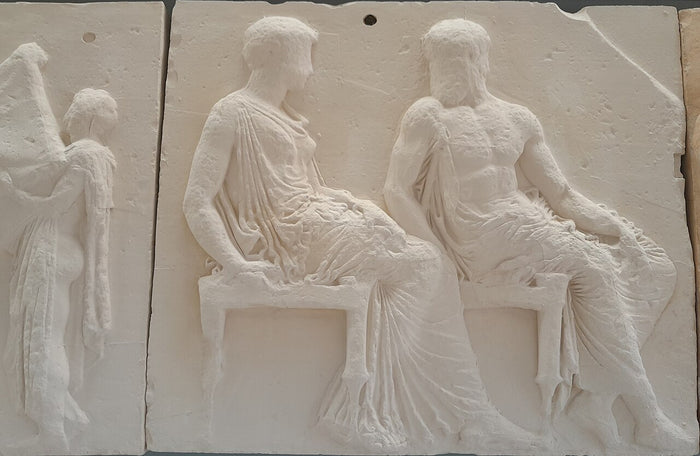 Parthenon frieze replica: Hephaestus seated beside Athena, his close partner in Athenian cult and craft.