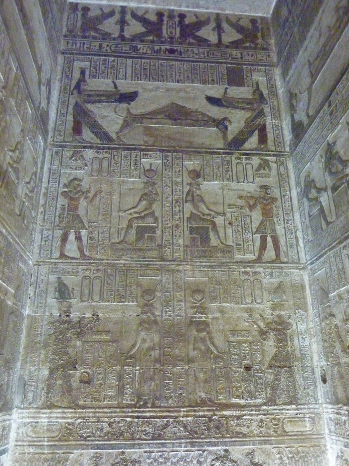 Chapel of Osiris in Dendera Temple, with reliefs of the god's funerary bier, winged goddesses, and Hathor.