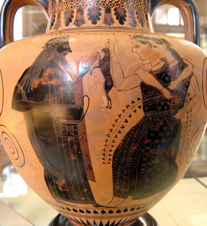 Black-figure amphora by the Amasis Painter, c. 540 BC: bearded Dionysos holds a vessel, facing maenads, one with a fawn.