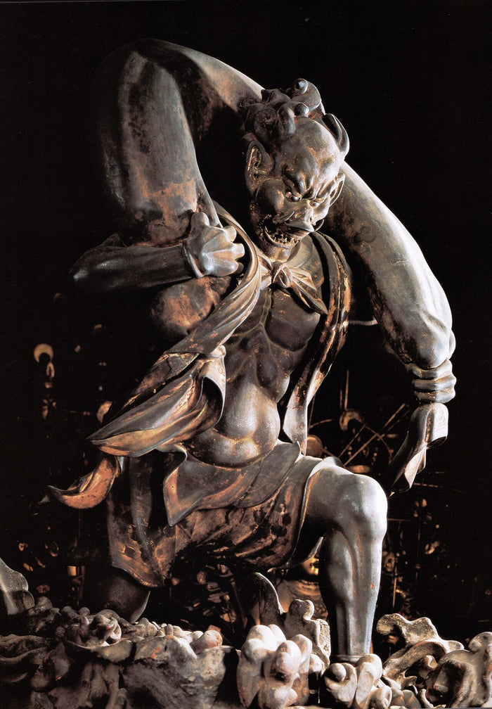 Fūjin statue at Sanjūsangen-dō, 13th century, carrying his wind bag as a guardian figure in the temple.