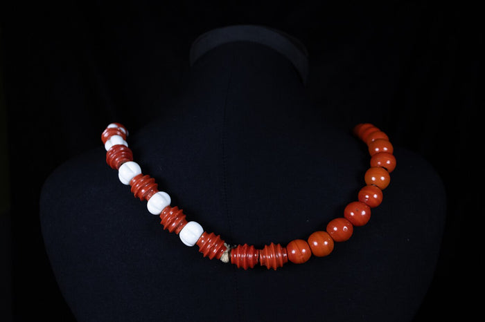 Xangô's ritual bead necklace in red and white, the colours devotees wear to honour the orisha.