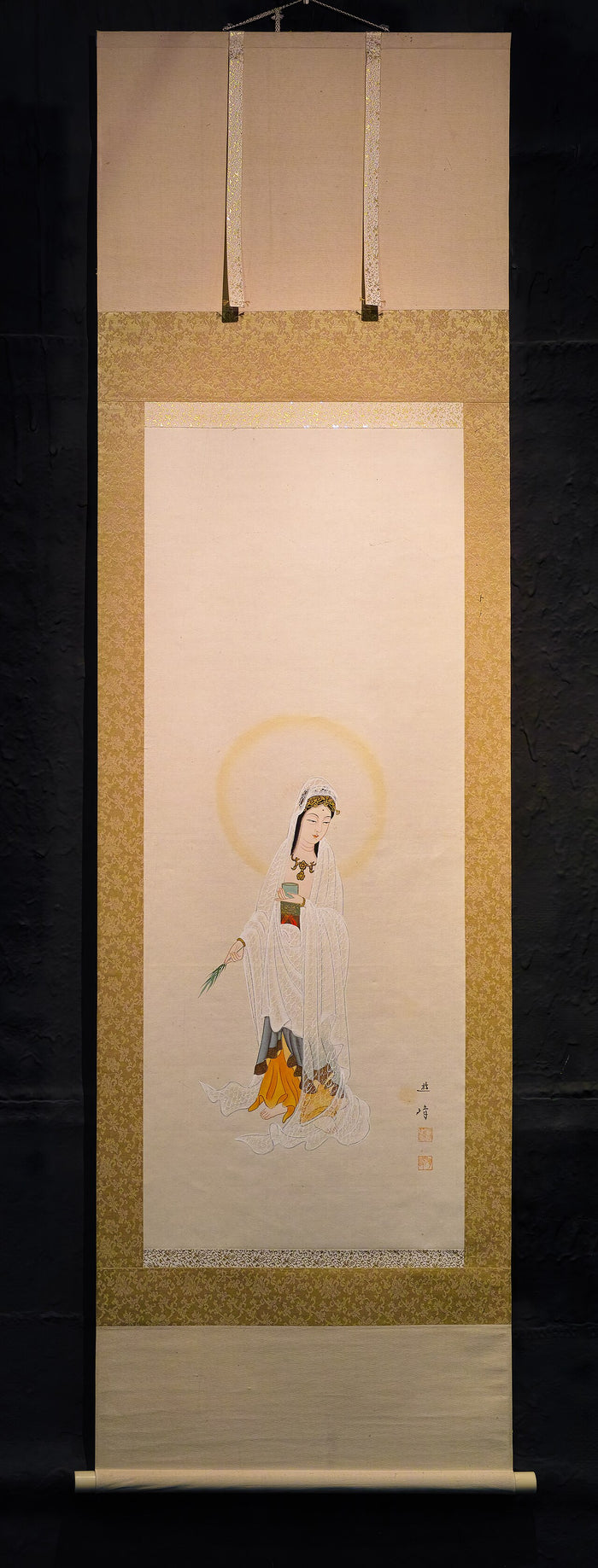 Japanese hanging scroll of white-robed Guanyin (Kannon) with halo, vase and willow branch, showing the feminine form of the deity.