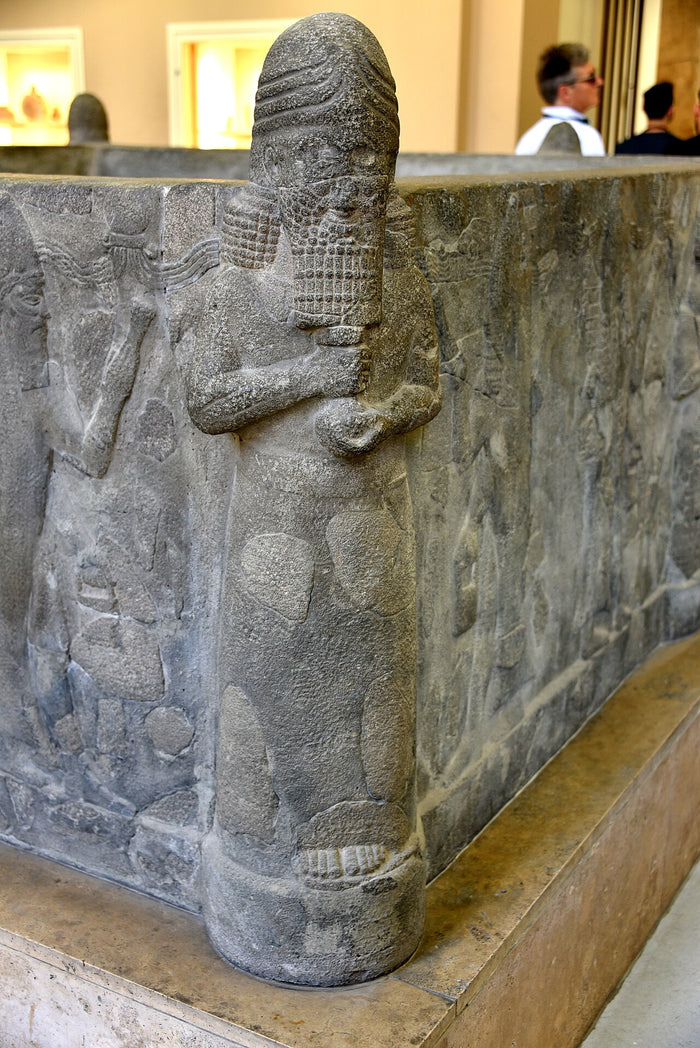 Ea (Enki) carved on a basalt water basin from Assur, reign of Sennacherib, 7th century BCE.