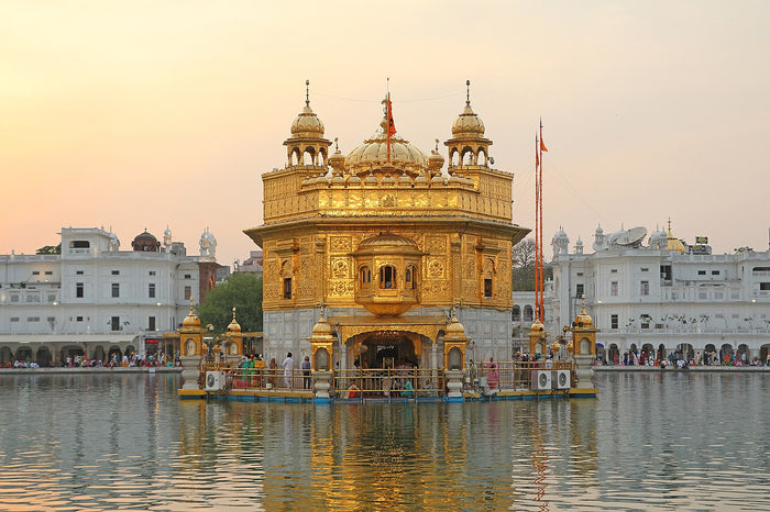 Golden Temple (Harmandir Sahib), Amritsar, the central Sikh shrine, where the Nishan Sahib flag is raised.