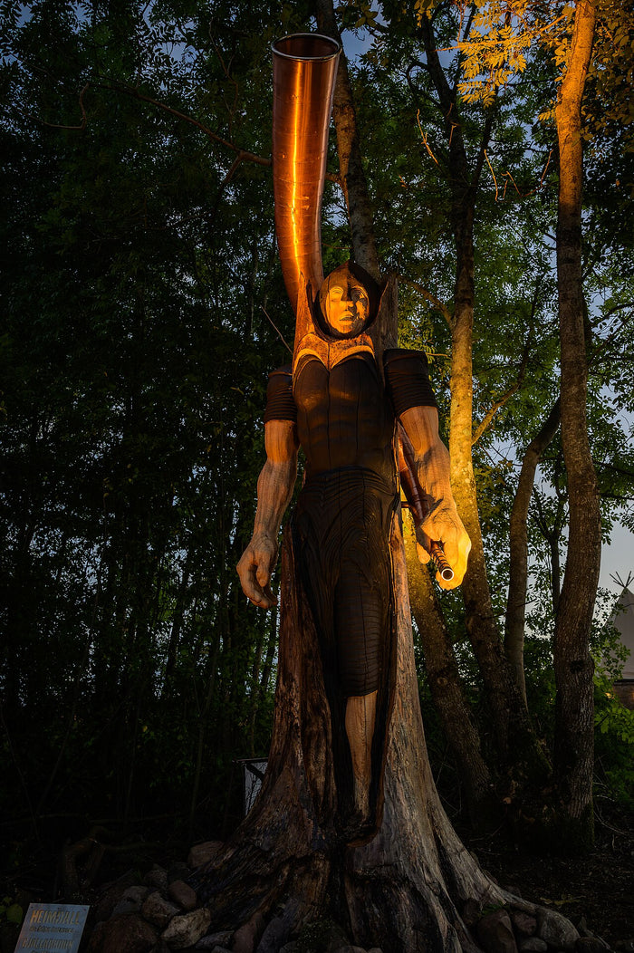 Wooden Heimdall statue with a huge horn, carved from a tree at the Midgardsblot festival, 2023.