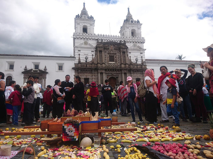 Indigenous participants in an Inti Raymi celebration in front of San Francisco church, Quito, 2019, showing the festival's living Kichwa continuation.