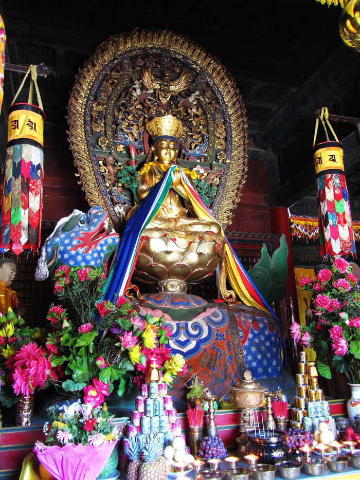 Manjushri statue on a lion-mount enshrined at Luohou Temple (Wutaishan), a Tibetan-style hall devoted to the bodhisattva.