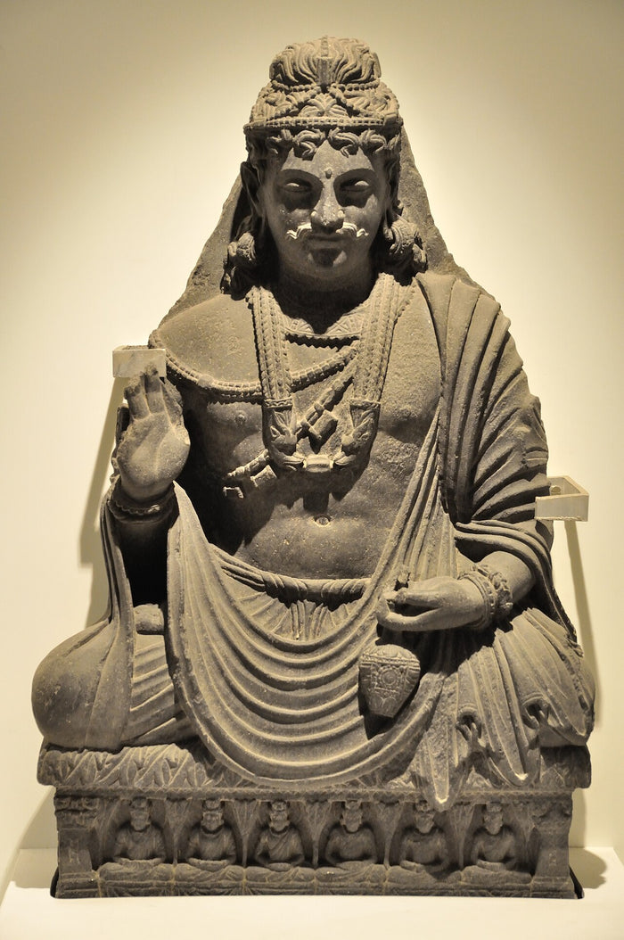 Gandharan schist Maitreya, circa 2nd century CE, from Loriyan Tangai, Indian Museum Kolkata; shows early princely bodhisattva iconography.