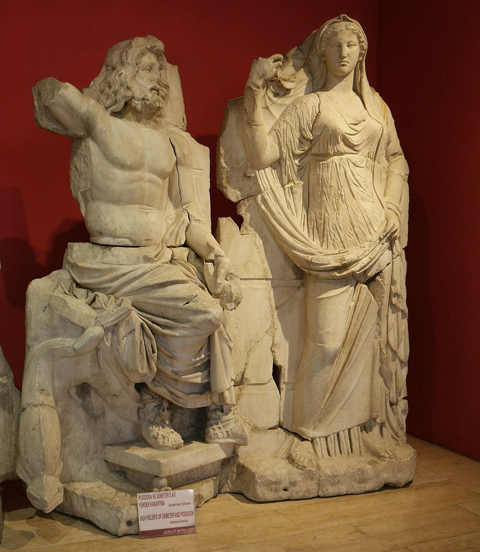 High relief of Poseidon and Demeter from the Agora of Smyrna, showing the god enthroned beside a goddess.