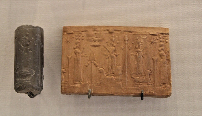 Cylinder seal and its clay impression (AO 7217), titled as showing the cult of Marduk and Nabu.