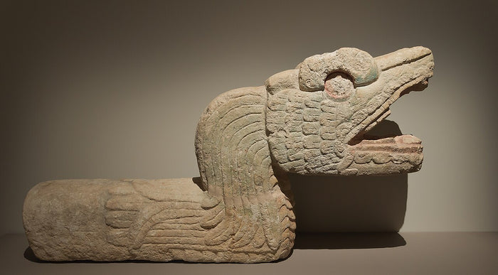 Feathered serpent sculpture from Chichen Itza, showing the Maya Kukulkan form of the deity.