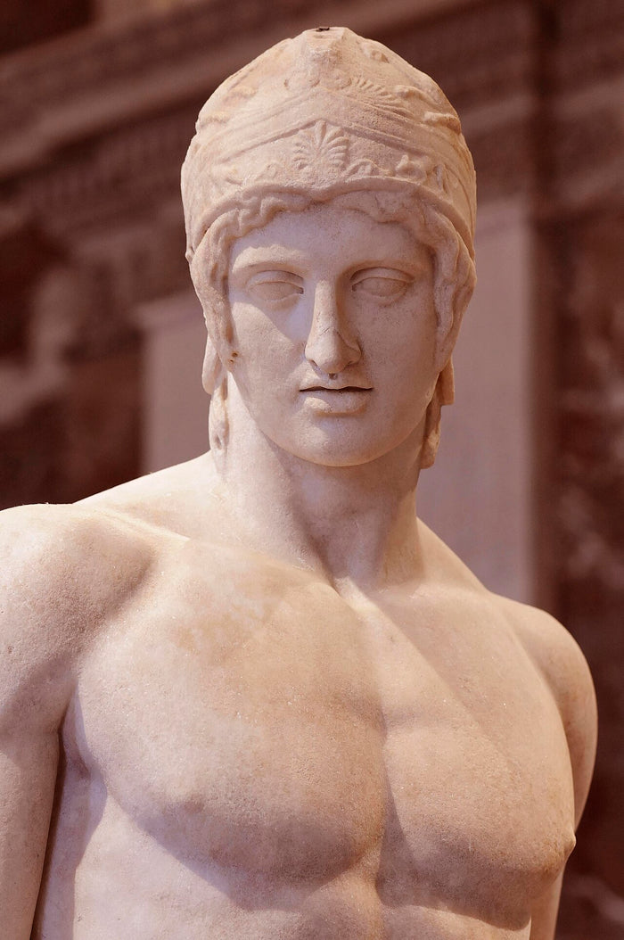 Ares Borghese, a Roman marble copy of a Greek original, shown in a crested helmet as god of war (Louvre).