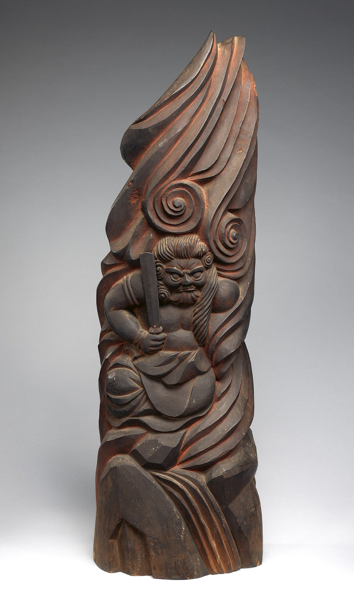 Edo-period (1805) carving of Fudō Myōō emerging from swirling flames, the fiery aureole central to his iconography.