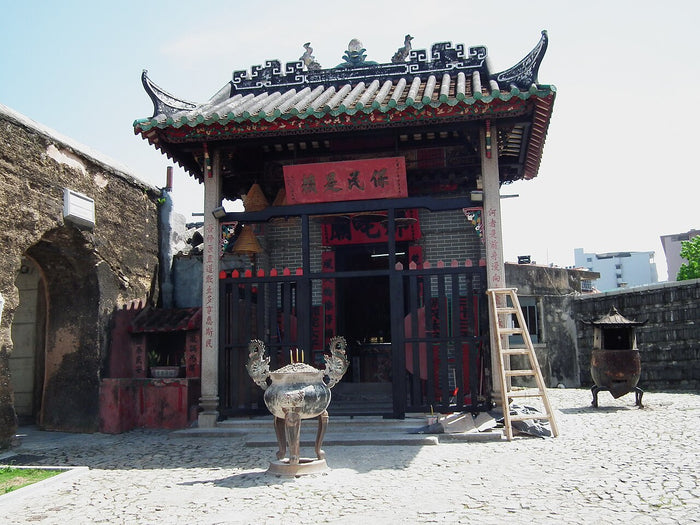 Nezha Temple in Macau, a small traditional shrine devoted to Nezha beside old city walls.