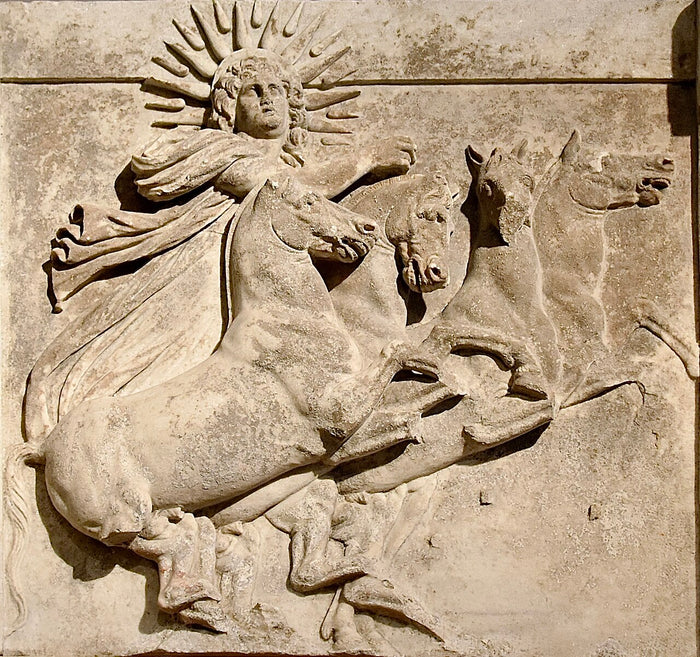 Metope from the temple of Athena at Troy, c. 300–280 BCE: radiate Helios driving his four-horse chariot.