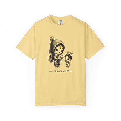 Radha · “Her name comes first.” — Garment-Dyed One-Ink Tee