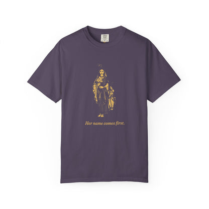 Radha · “Her name comes first.” — Garment-Dyed One-Ink Tee