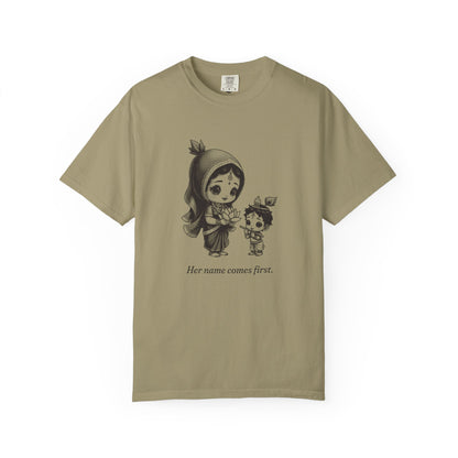 Radha · “Her name comes first.” — Garment-Dyed One-Ink Tee