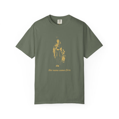 Radha · “Her name comes first.” — Garment-Dyed One-Ink Tee
