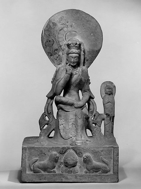 Maitreya in pensive pose on a lion-fronted base with an attendant, China, after 599.