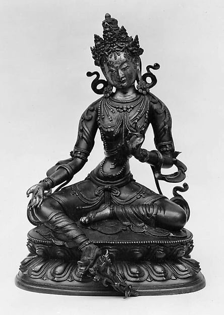 Seated Green Tara, Tibet, 17th–18th century: right leg extended, right hand in a giving gesture, lotus stem at left.