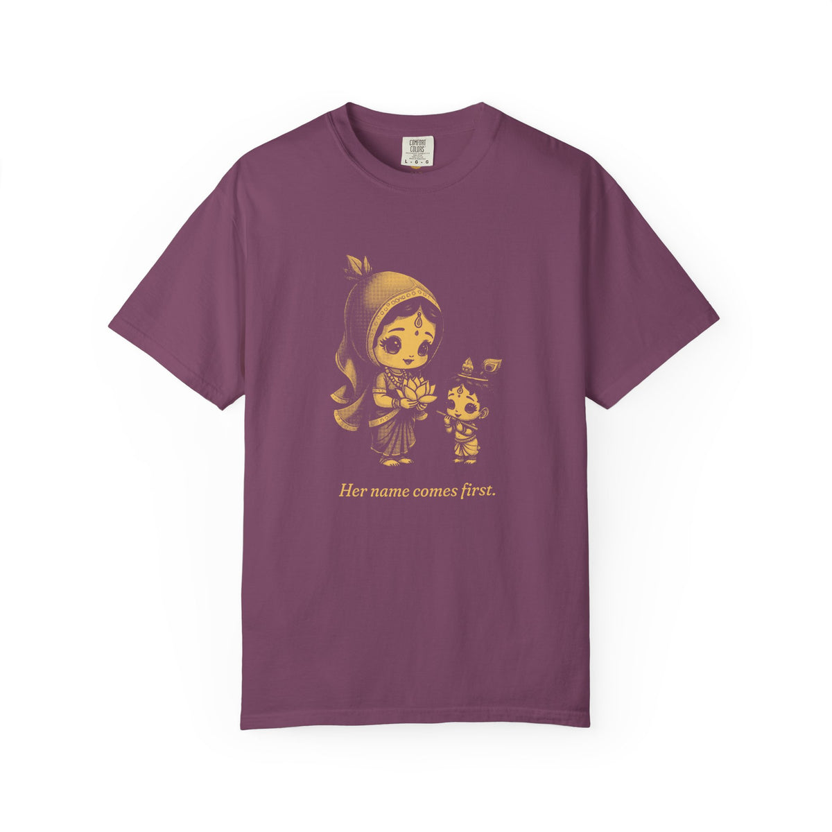 Radha · “Her name comes first.” — Garment-Dyed One-Ink Tee