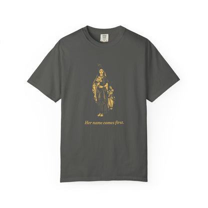 Radha · “Her name comes first.” — Garment-Dyed One-Ink Tee