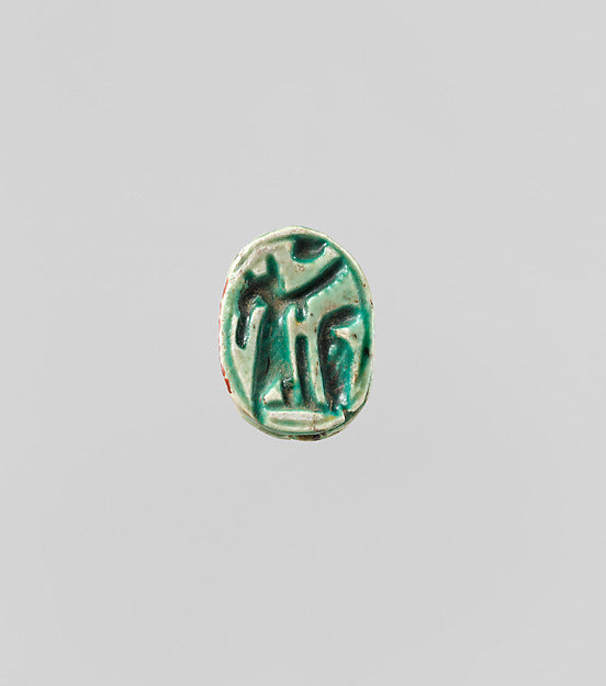 Glazed scarab with a winged figure of Seth-Baal, ca. 1300–1080 BCE, Egypt, showing Set's syncretism with Baal.