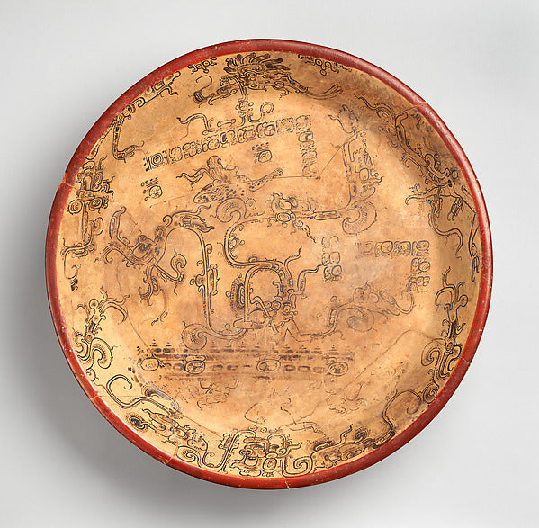 Classic-period Maya plate painted with the god Chahk, the southern lowland spelling of his name, among serpentine forms.
