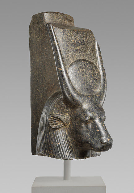 Cow goddess head with horns and sun disk, about 1300–1080 BCE, showing Hathor's bovine form.