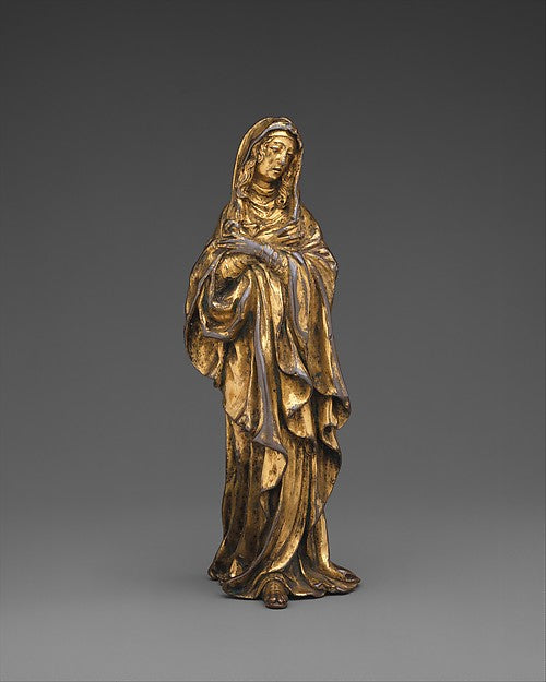 Gilt bronze standing Virgin Mary, ca. 1585–90, veiled and with hands crossed in a mourning pose.