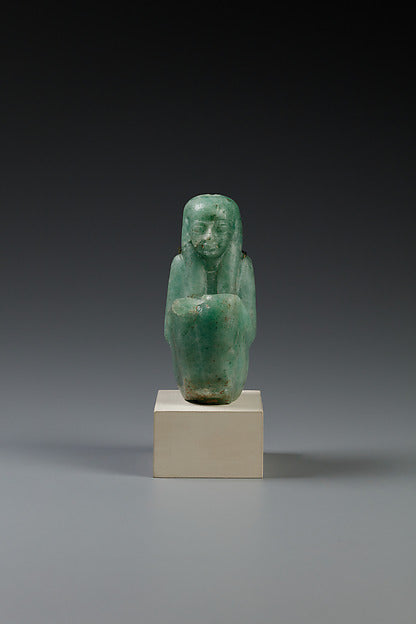 Green stone figure of the kneeling goddess Ma'at, c. 945–721 BCE, Third Intermediate Period.