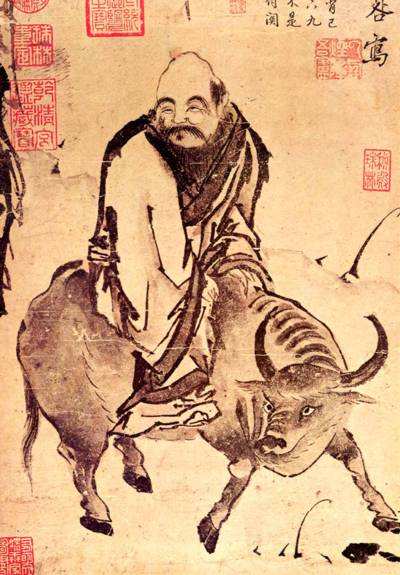 Laozi on his ox in ink painting, a smiling, bespectacled sage in a different artistic tradition from the Ming scroll.