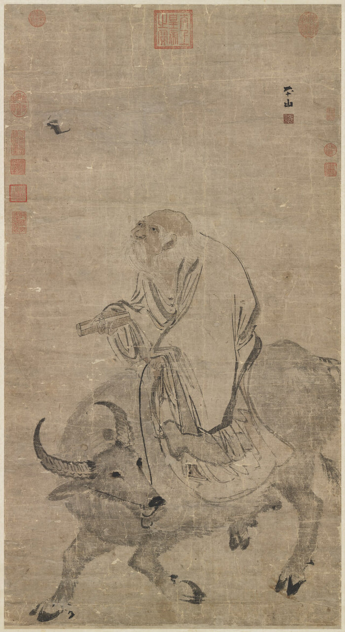 Ming-dynasty hanging scroll of Laozi riding a water buffalo and holding a scroll, a classic image of his departure westward.